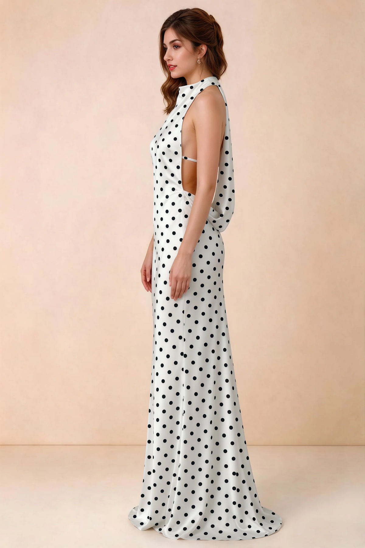 Side view of Astrid white polka dot halter maxi dress, showing the side profile.