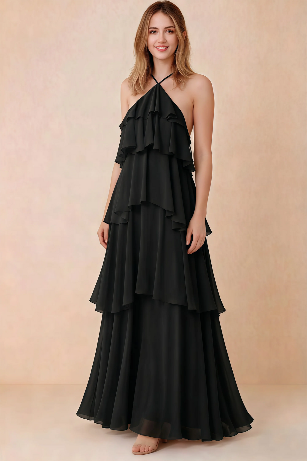 Front view of Audrey black chiffon maxi dress with crossed halter straps and cascading tiered ruffles