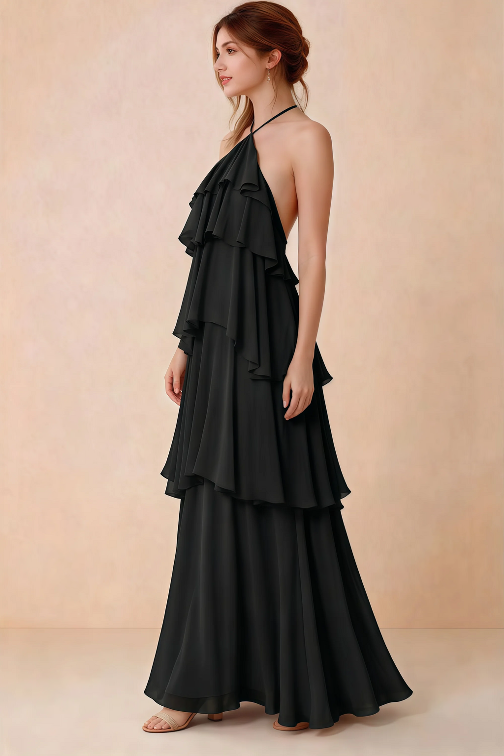 Side view of Audrey black chiffon dress showing the relaxed shape and layered ruffles