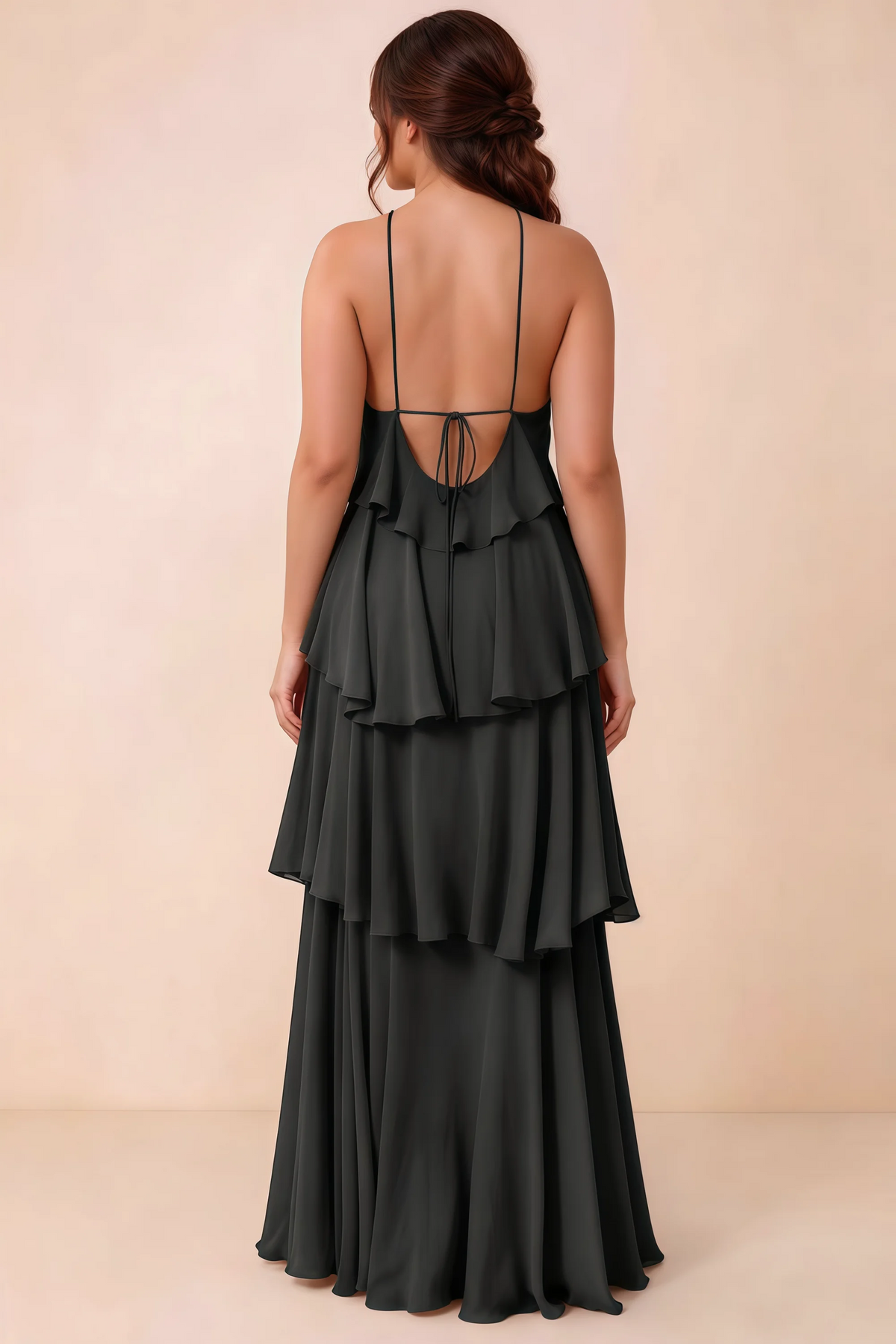 Rear studio view of Audrey black tiered chiffon dress showing the low back and fine ties