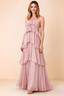 Front view of Audrey blush chiffon maxi dress with crossed halter straps and cascading tiered ruffles
