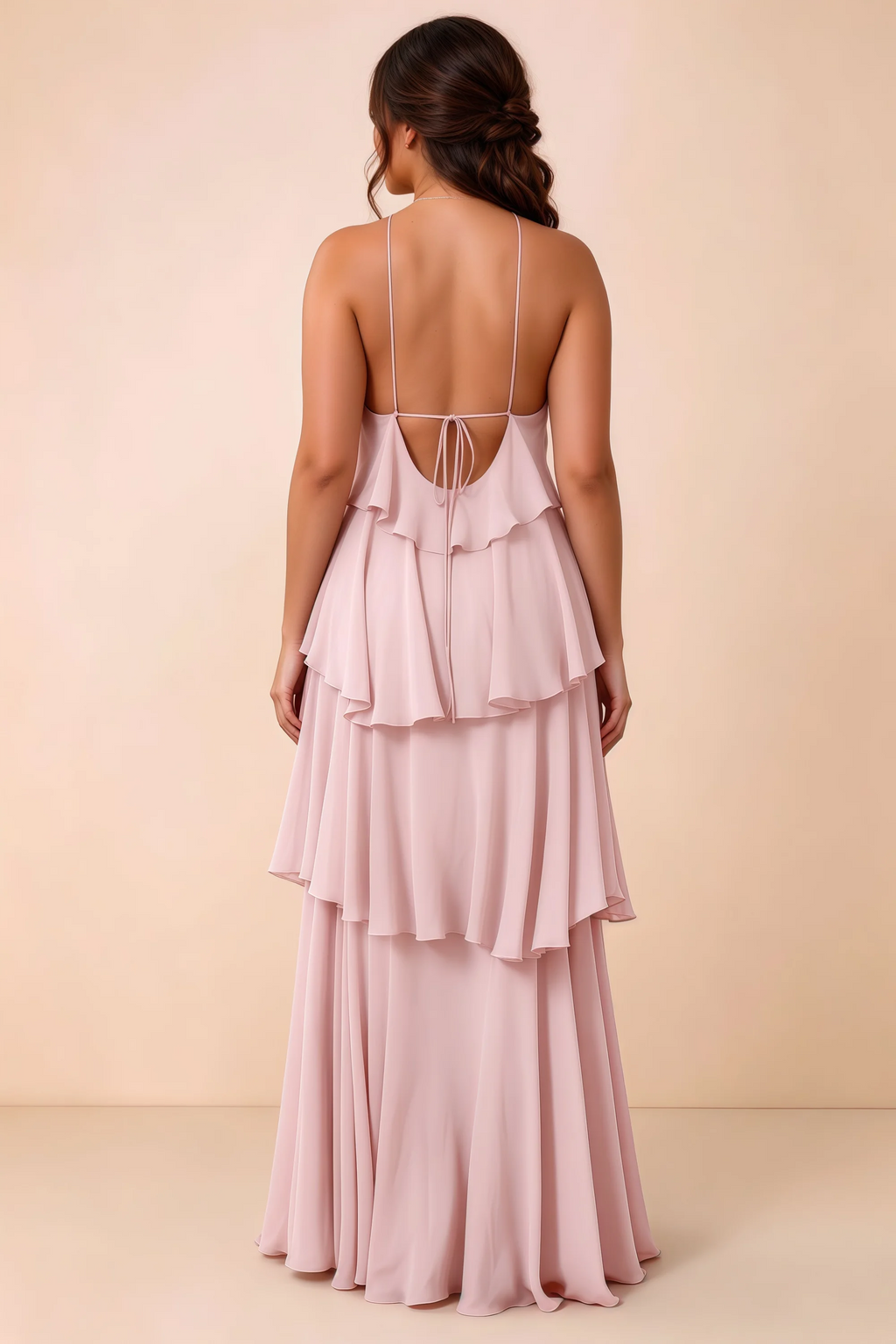 Rear studio view of Audrey blush tiered chiffon dress showing the low back and fine ties