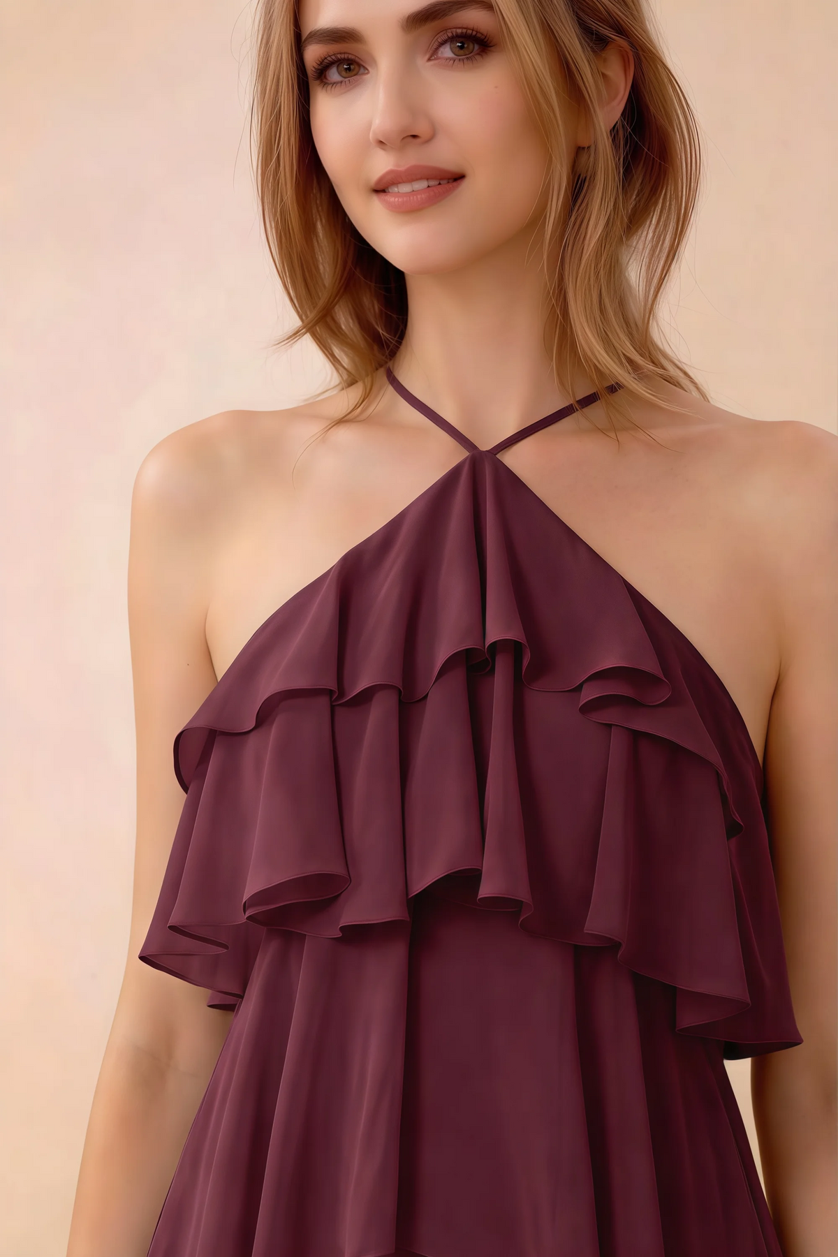 Close-up of Audrey cabernet crossed halter neckline and soft chiffon ruffles