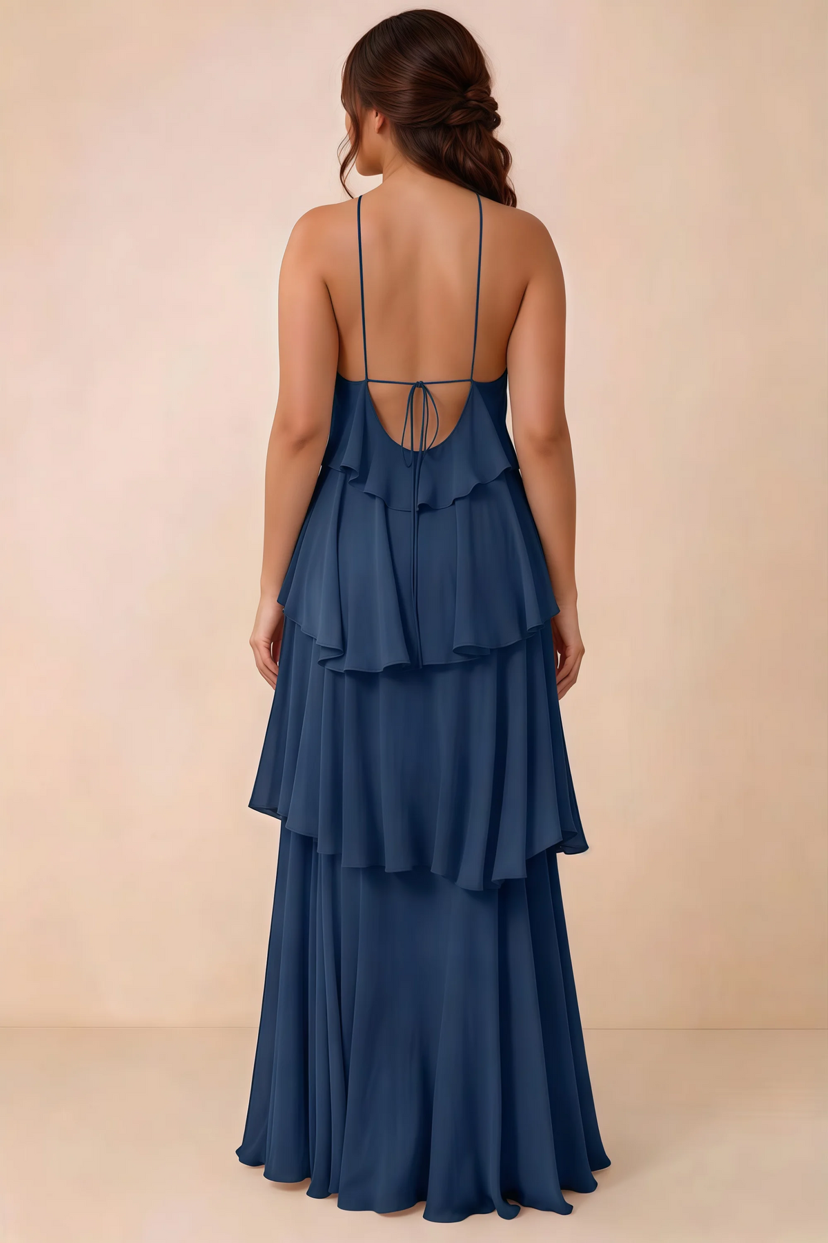 Rear studio view of Audrey navy tiered chiffon dress showing the low back and fine ties