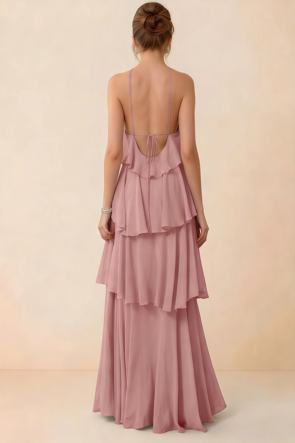 Back view of Audrey dusty rose ruffle maxi dress showing a low open back and fine tie straps