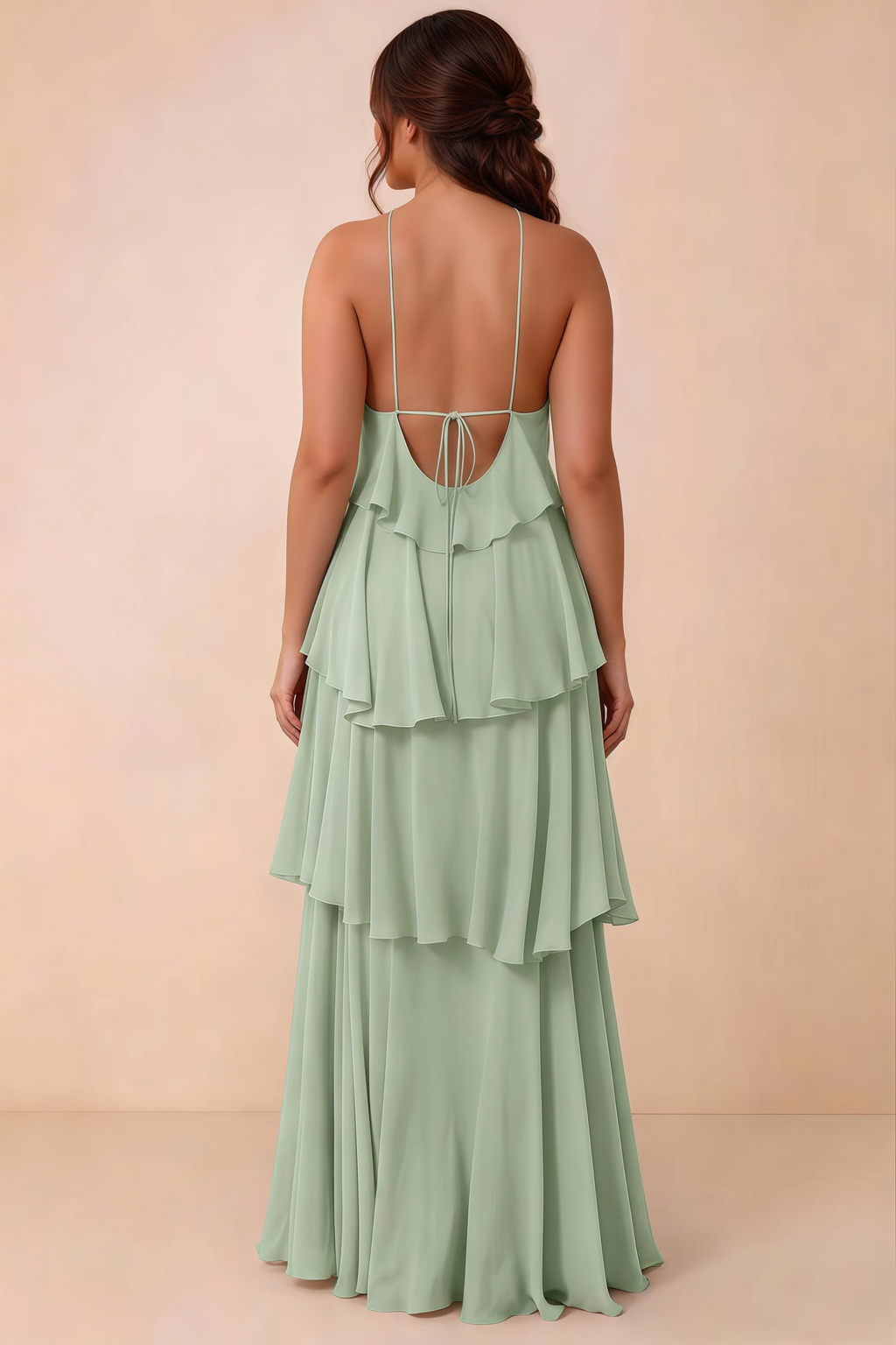 Rear studio view of Audrey sage green tiered chiffon dress showing the low back and fine ties