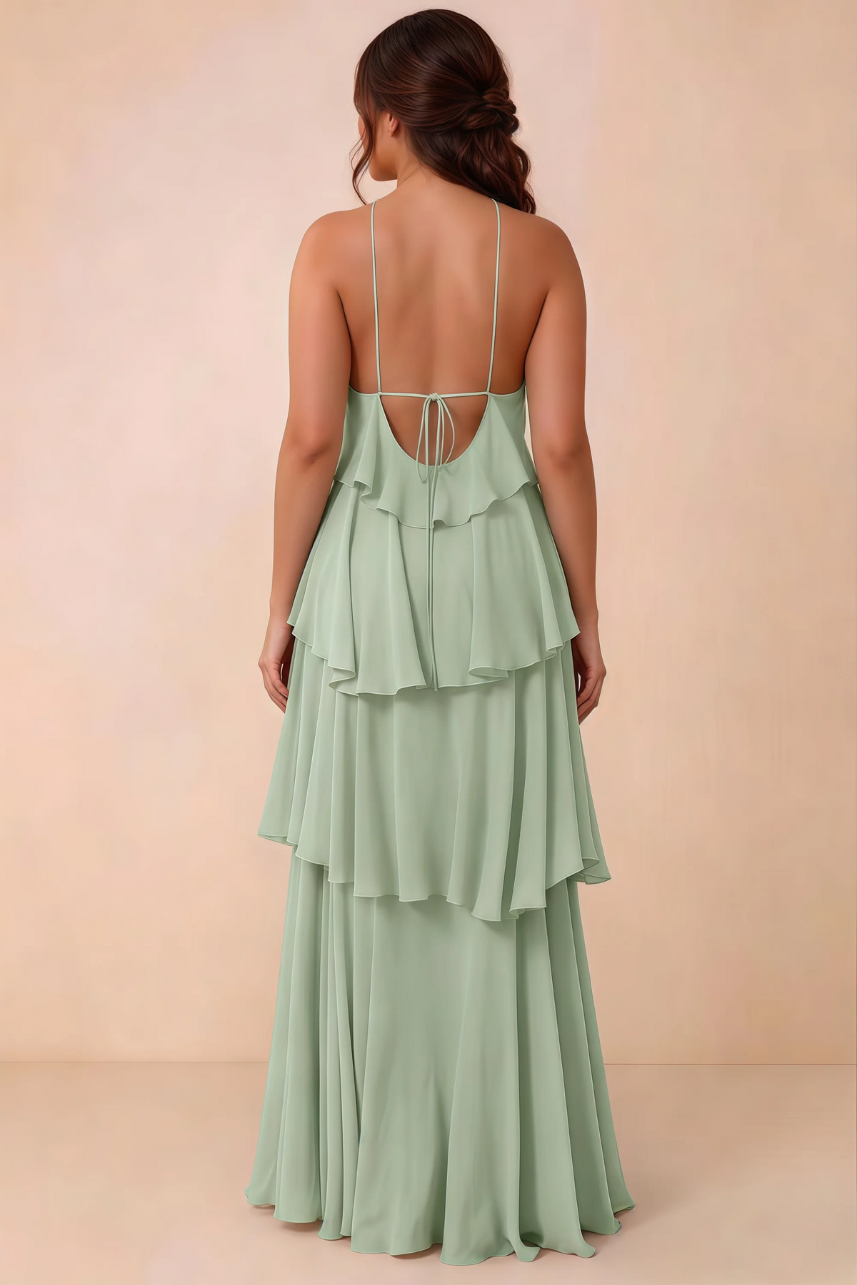 Rear studio view of Audrey sage green tiered chiffon dress showing the low back and fine ties