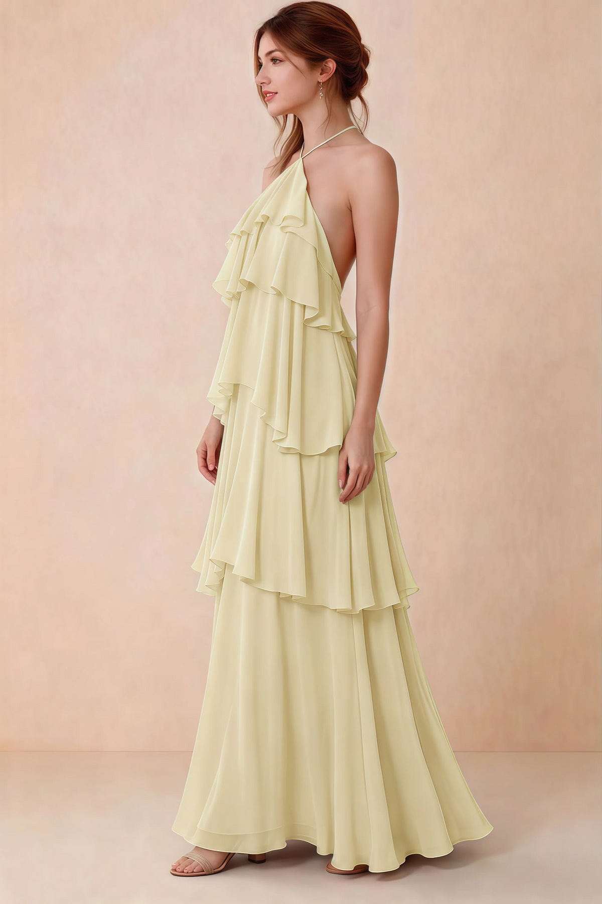 Side view of Audrey lemon chiffon dress showing the relaxed shape and layered ruffles