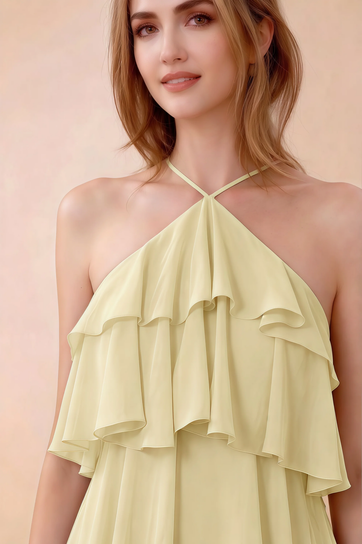Close-up of Audrey lemon crossed halter neckline and soft chiffon ruffles