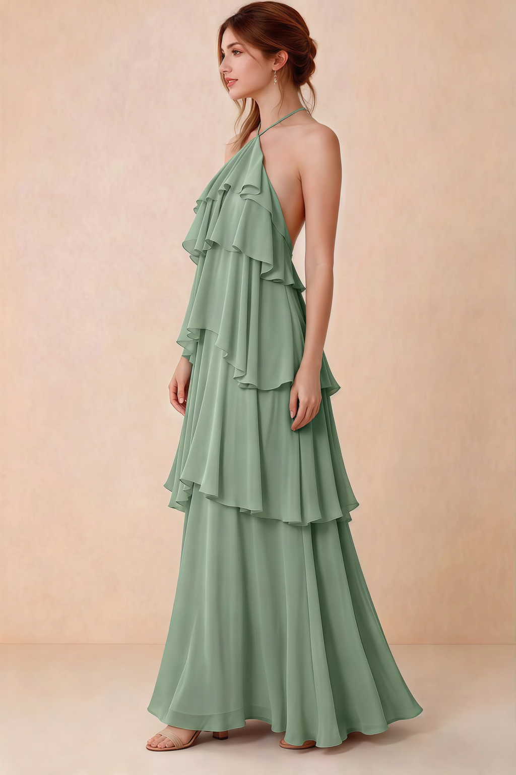 Side view of Audrey matcha green chiffon dress showing the relaxed shape and layered ruffles