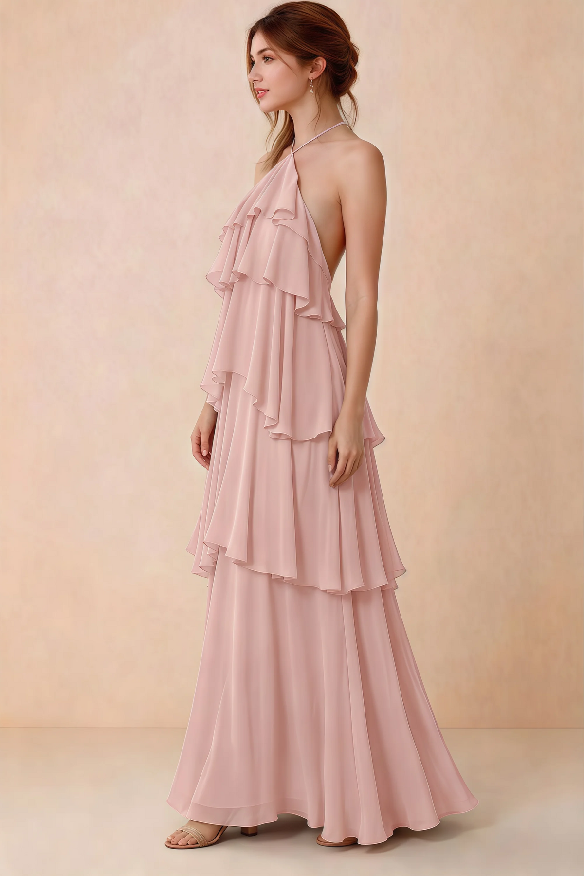 Side view of Audrey powder pink chiffon dress showing the relaxed shape and layered ruffles