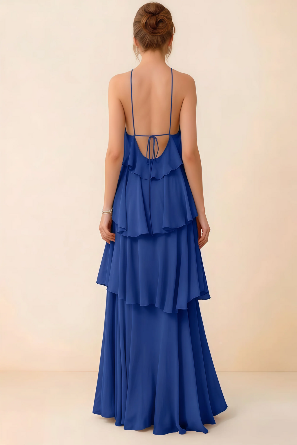 Back view of Audrey royal blue ruffle maxi dress showing a low open back and fine tie straps