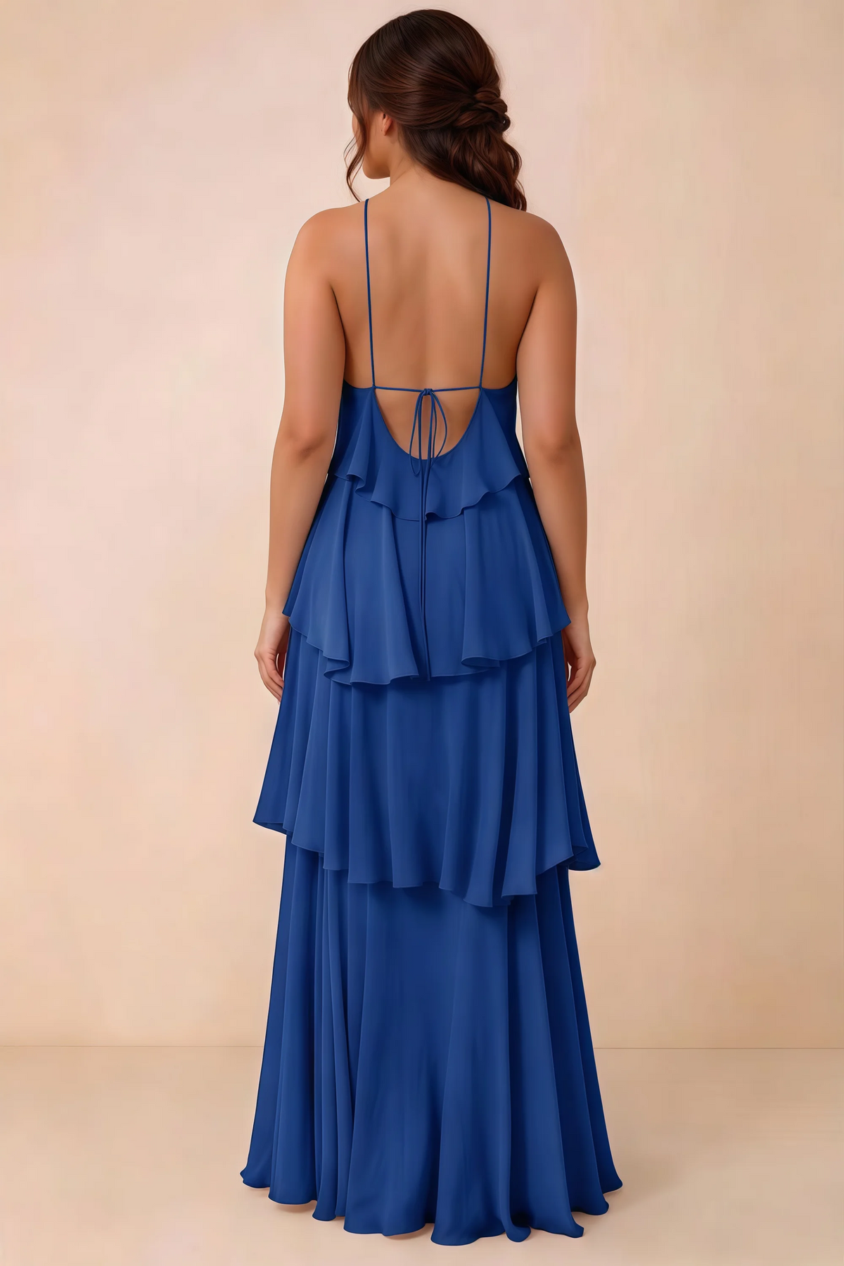 Rear studio view of Audrey royal blue tiered chiffon dress showing the low back and fine ties