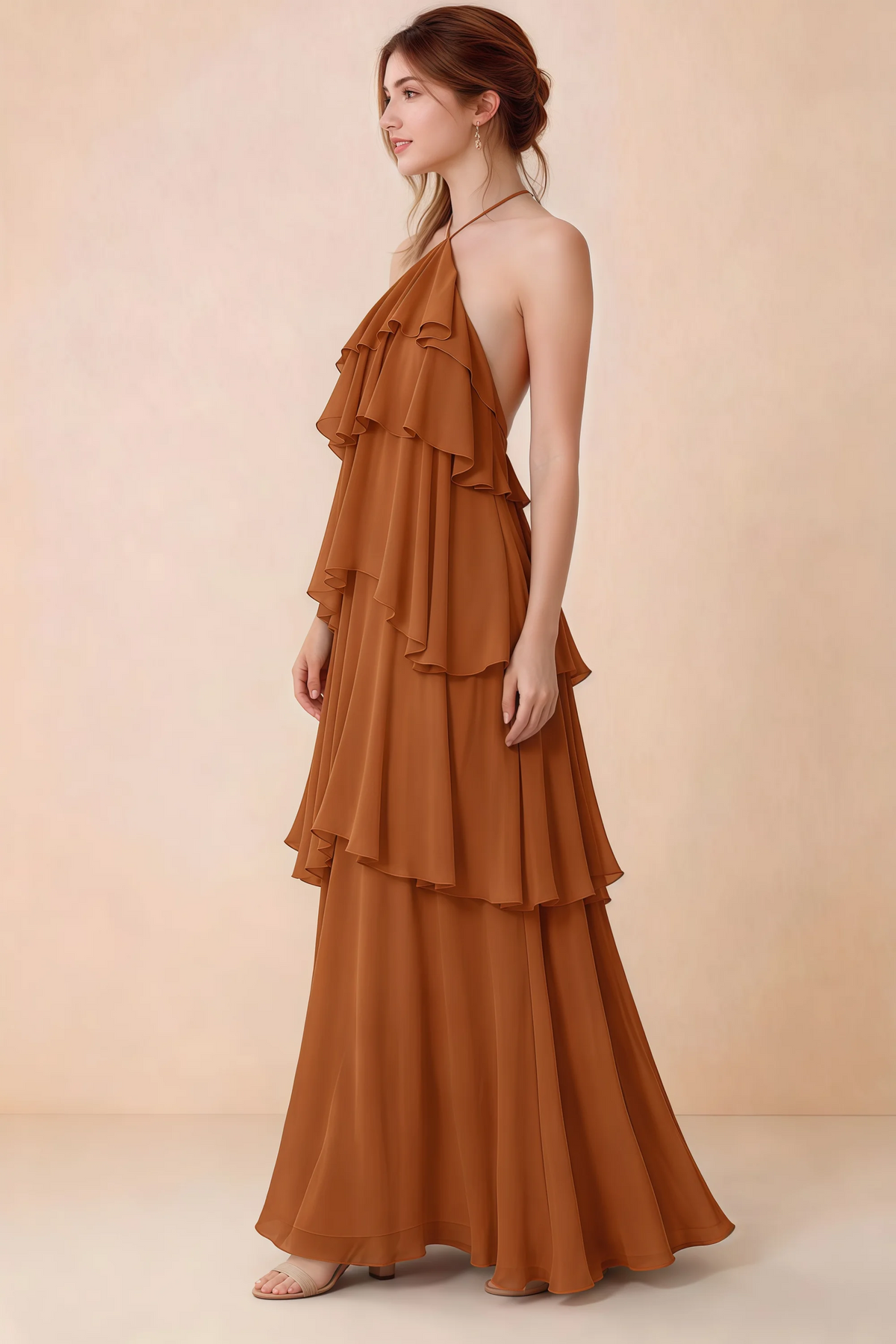 Side view of Audrey rust chiffon dress showing the relaxed shape and layered ruffles
