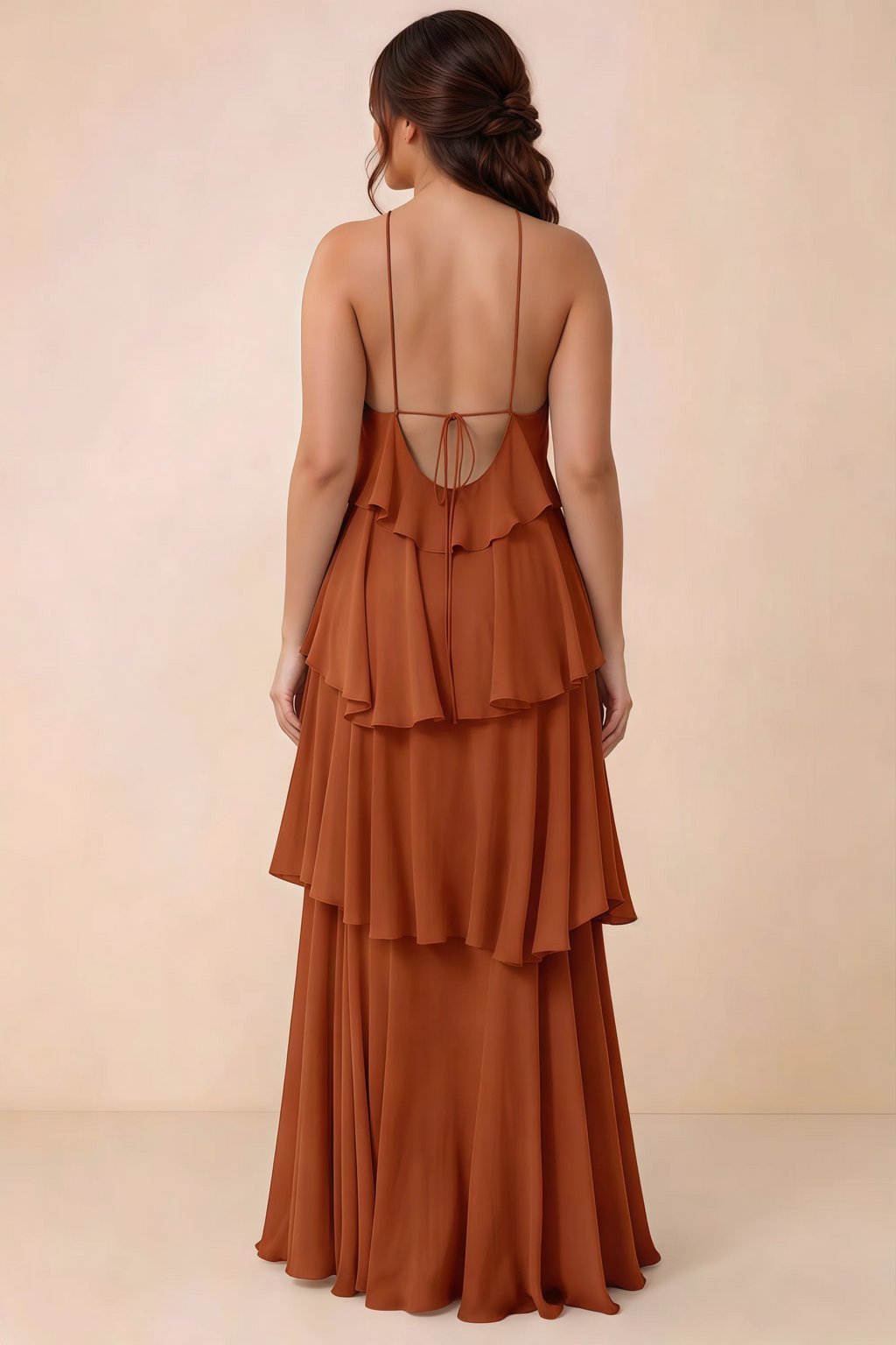 Rear studio view of Audrey rust tiered chiffon dress showing the low back and fine ties