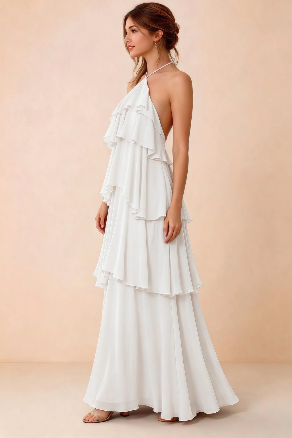 Side view of Audrey white chiffon dress showing the relaxed shape and layered ruffles