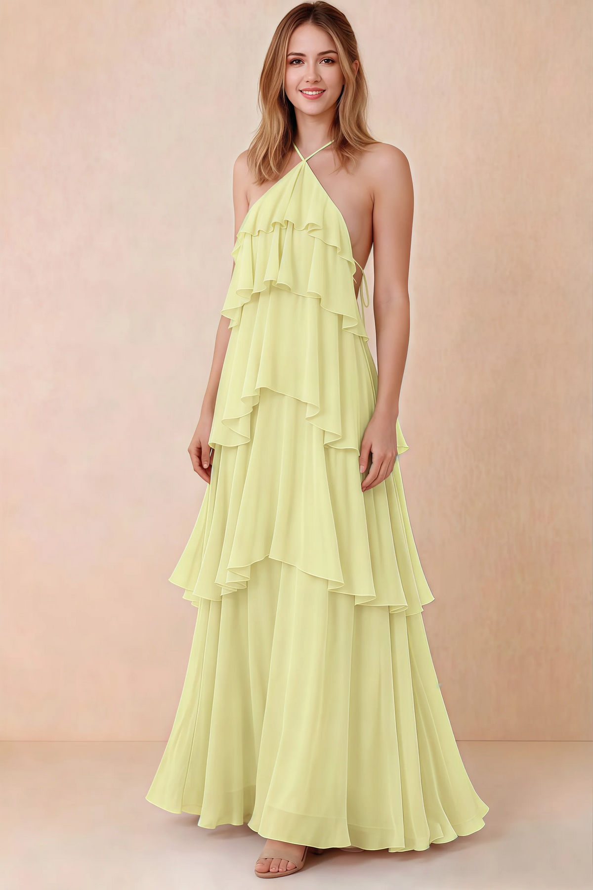 Front view of Audrey yellow chiffon maxi dress with crossed halter straps and cascading tiered ruffles