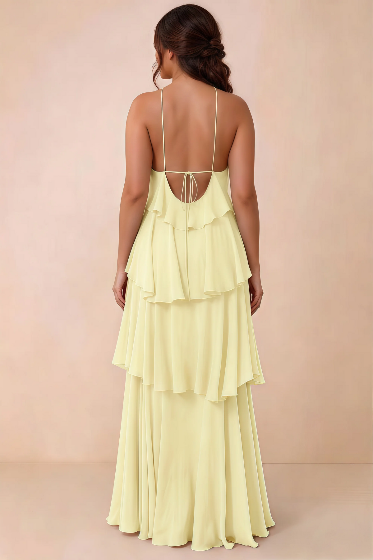 Rear studio view of Audrey yellow tiered chiffon dress showing the low back and fine ties
