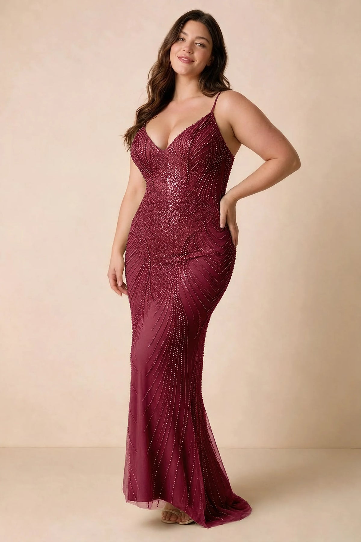 Front view of the Augusta burgundy V-neck mermaid maxi dress on a second model.