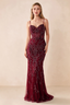 Front view of Aurelia burgundy sequin maxi dress with a sweetheart corset bodice and flared mermaid hem