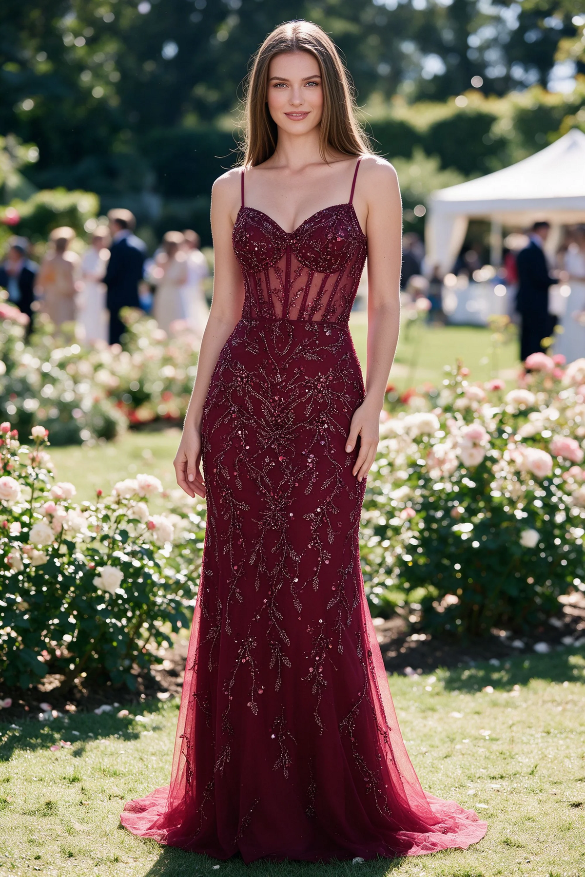 Aurelia burgundy sequin corset maxi dress shown from the front in a garden setting
