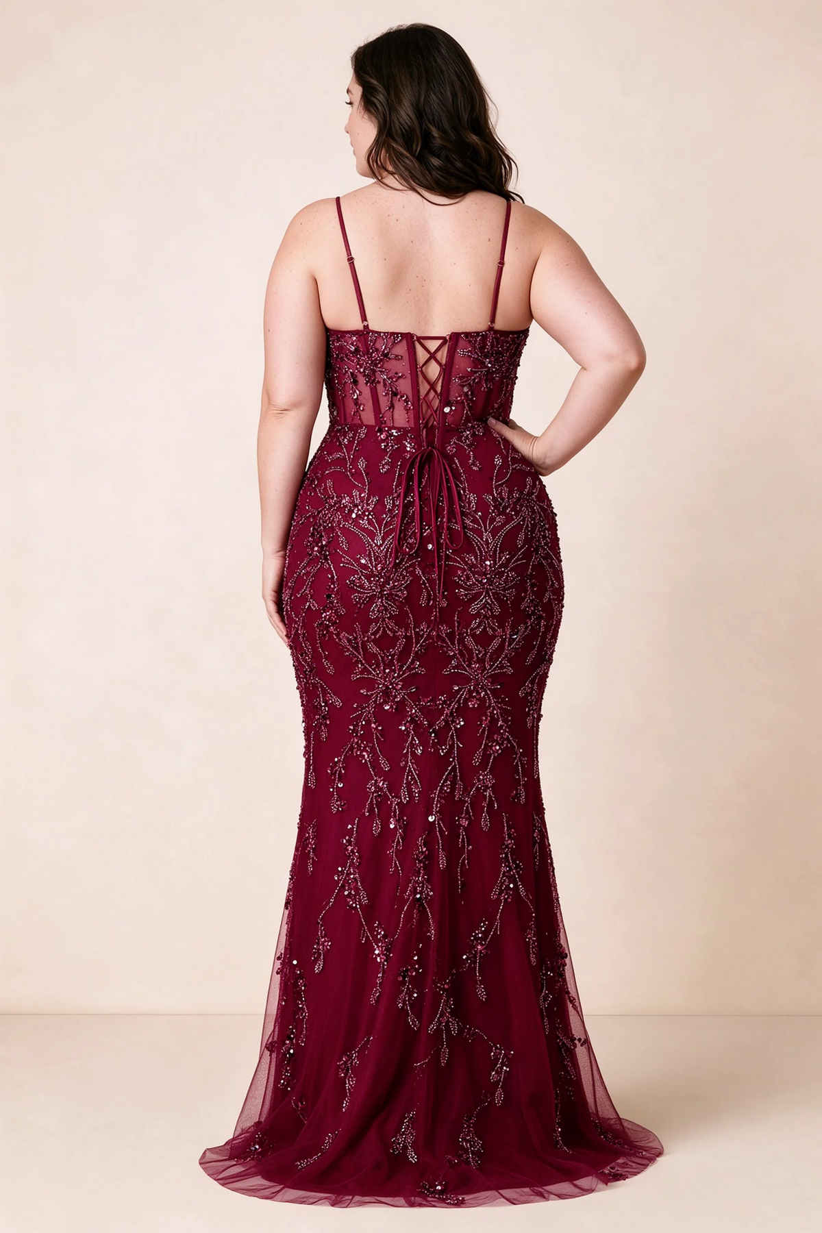 Back view on a second model showing the Aurelia burgundy corset dress and waist lacing