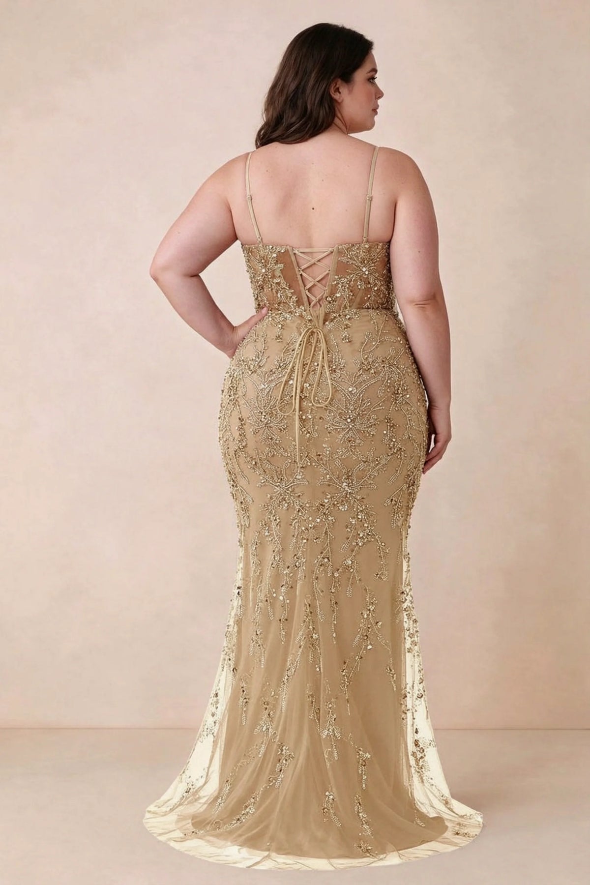 Back view on a second model showing the Aurelia champagne corset dress and waist lacing