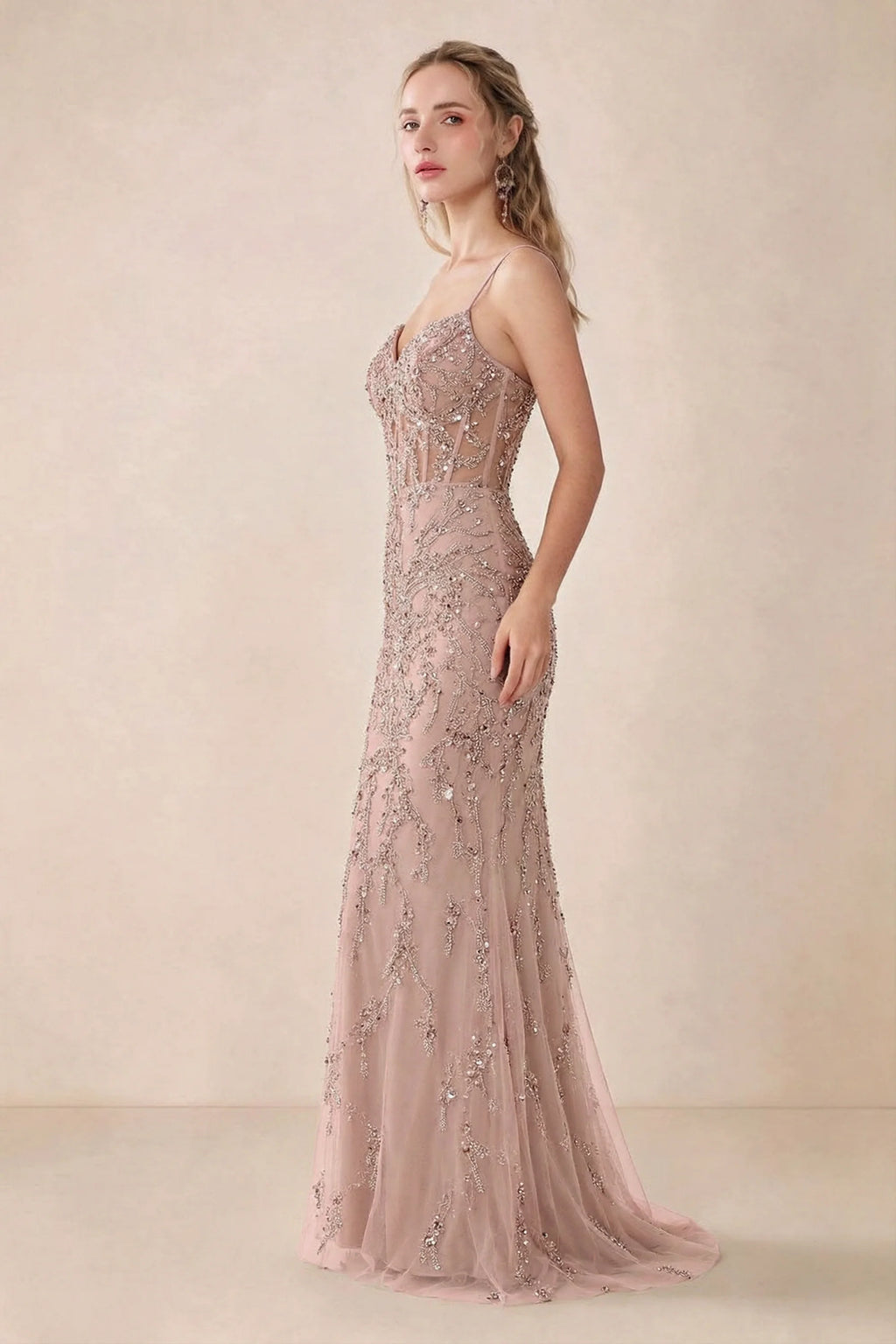 Side view of Aurelia light pink sequin maxi dress showing the fitted hips and flared hem