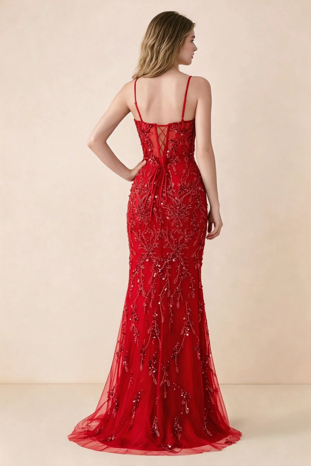 Back view of Aurelia red maxi dress showing spaghetti straps and crossed waist lacing