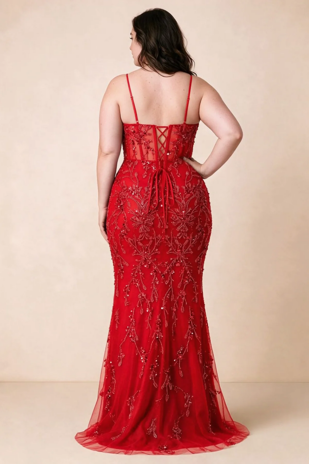 Back view on a second model showing the Aurelia red corset dress and waist lacing