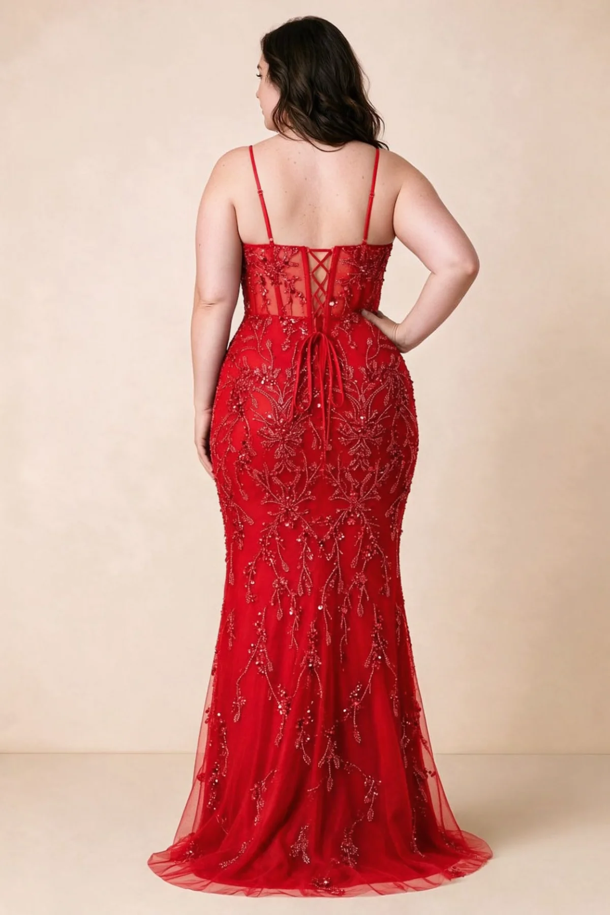 Back view on a second model showing the Aurelia red corset dress and waist lacing