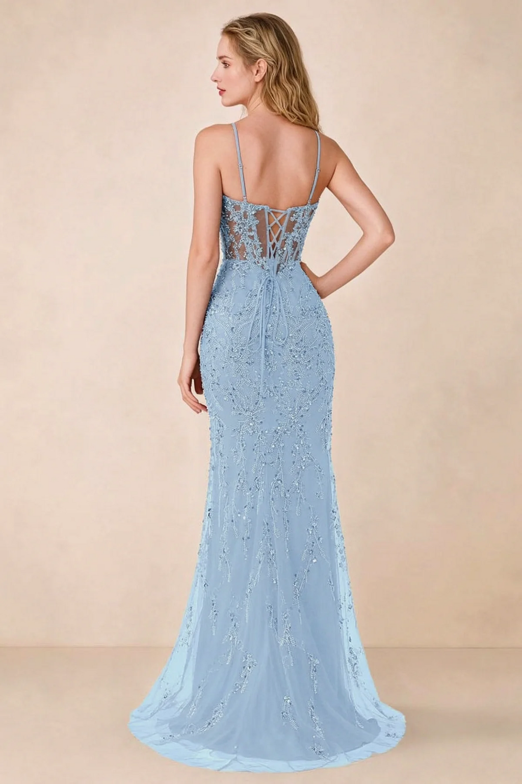 Back view of Aurelia sky blue maxi dress showing spaghetti straps and crossed waist lacing