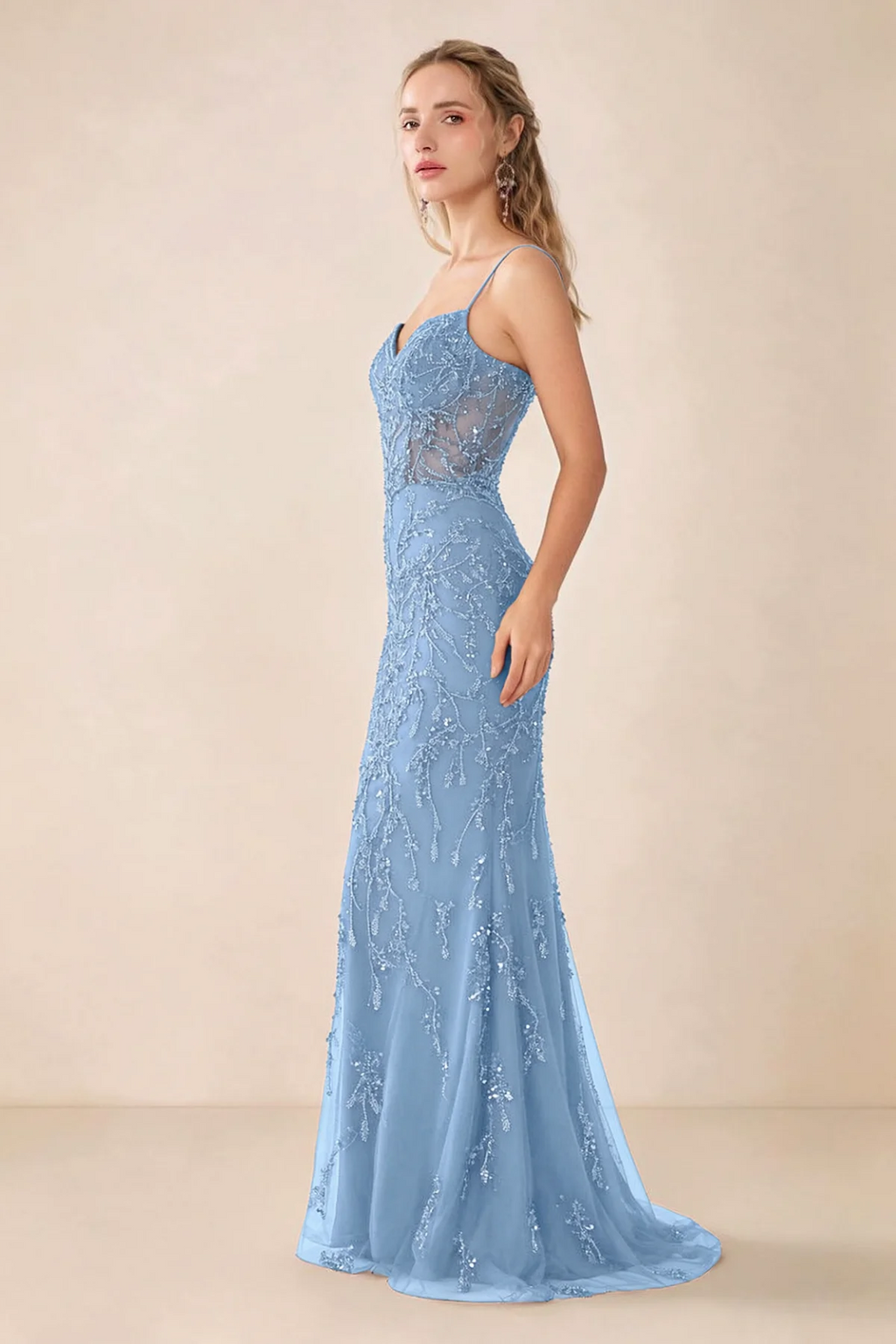 Side view of Aurelia sky blue sequin maxi dress showing the fitted hips and flared hem