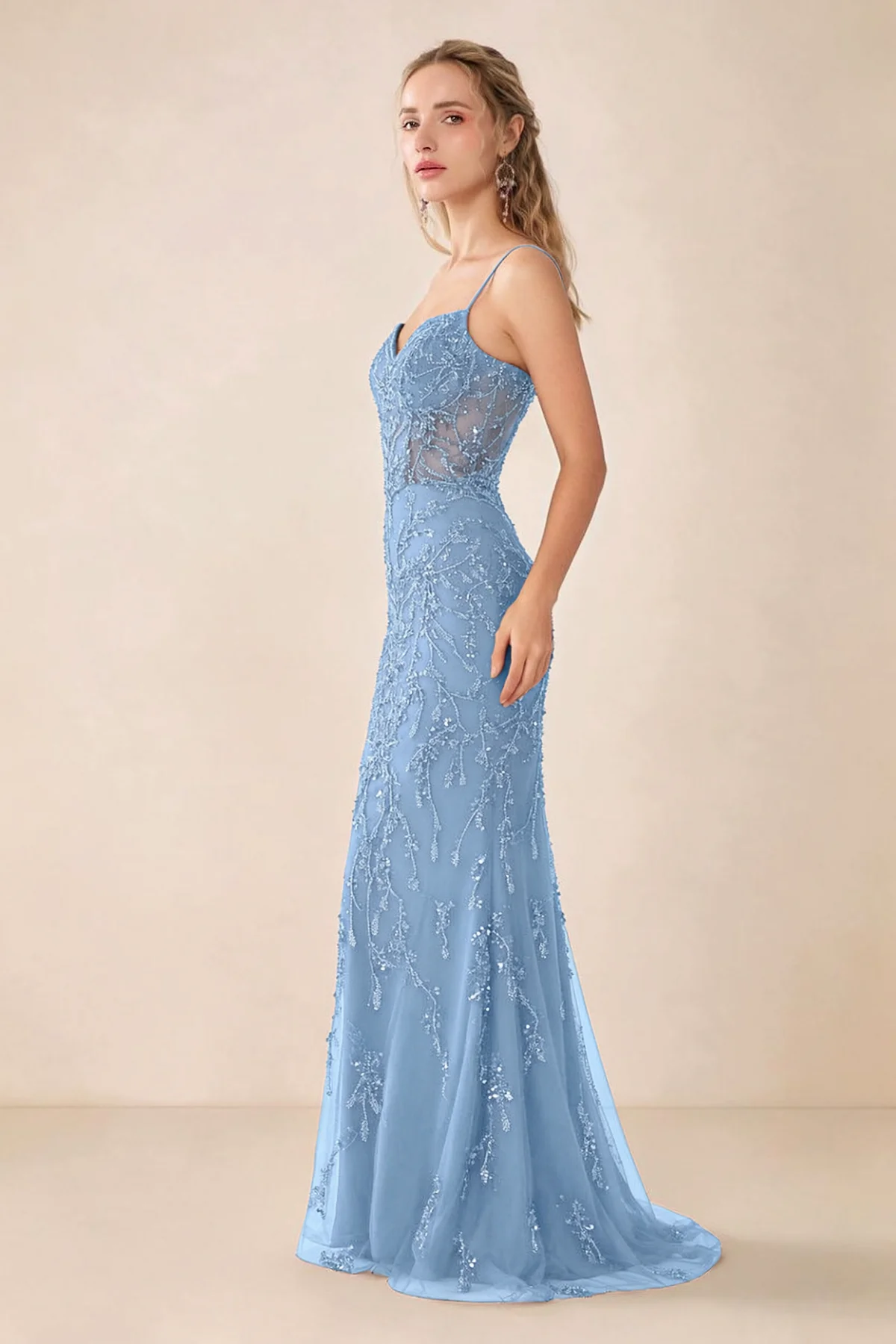 Side view of Aurelia sky blue sequin maxi dress showing the fitted hips and flared hem