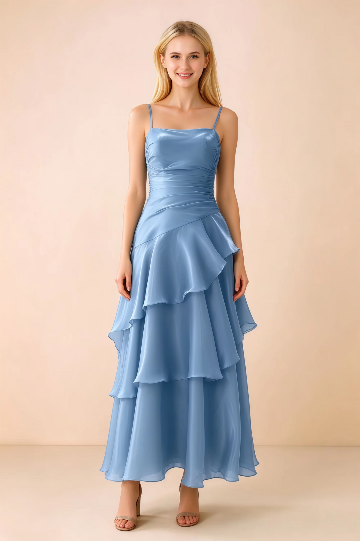 Front view of Ava baby blue chiffon maxi dress with thin straps, a fitted bodice and cascading ruffle tiers
