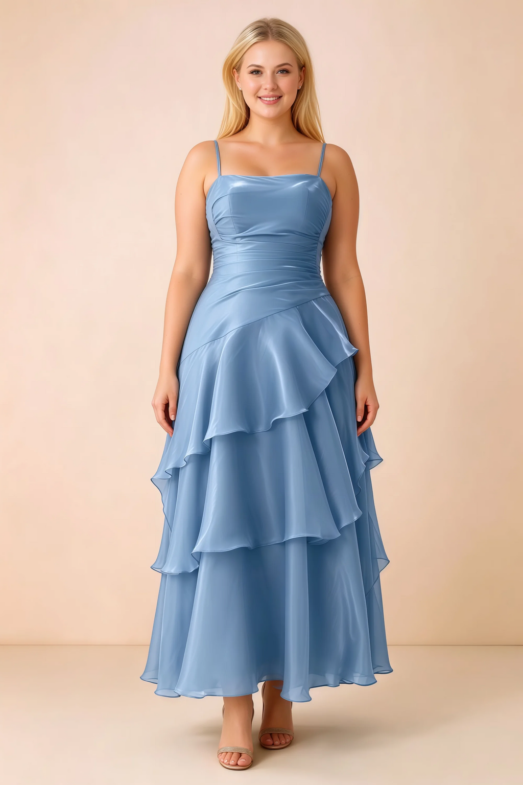 Front studio view of Ava baby blue ruffle dress with a straight neckline and gathered waist