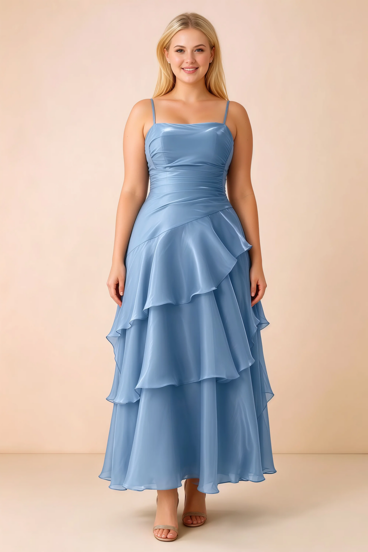 Front studio view of Ava baby blue ruffle dress with a straight neckline and gathered waist