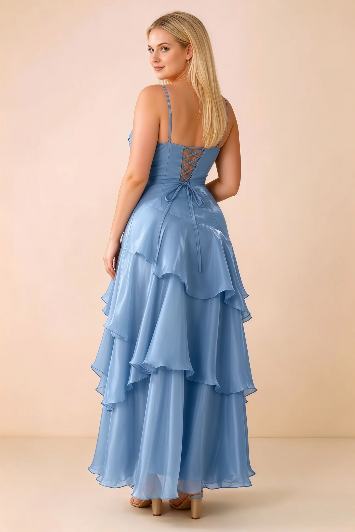 Rear studio view of Ava baby blue maxi dress showing the lace-up bodice and long tiered skirt
