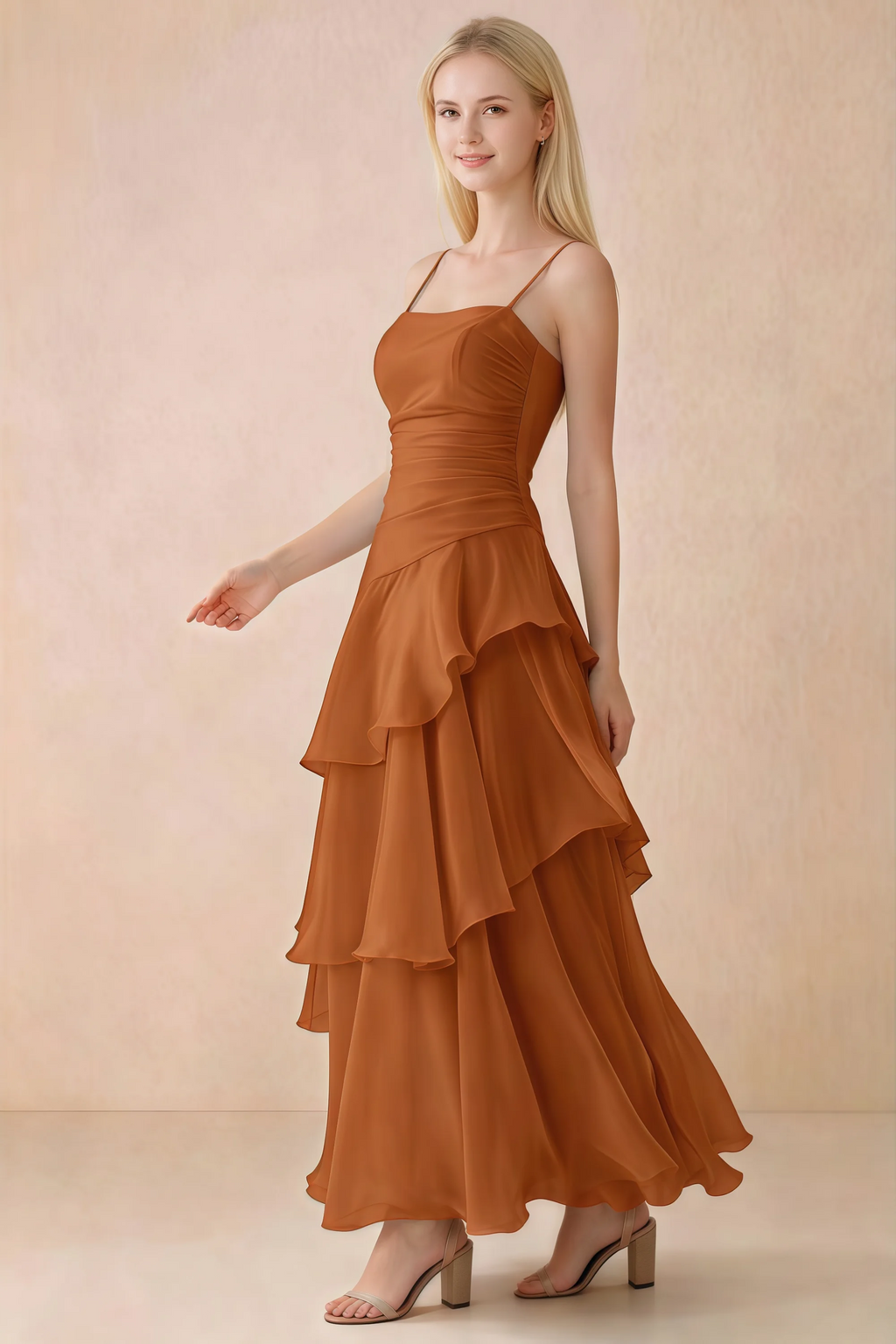 Side view of Ava burnt orange maxi dress showing the fitted waist and flared ruffle skirt