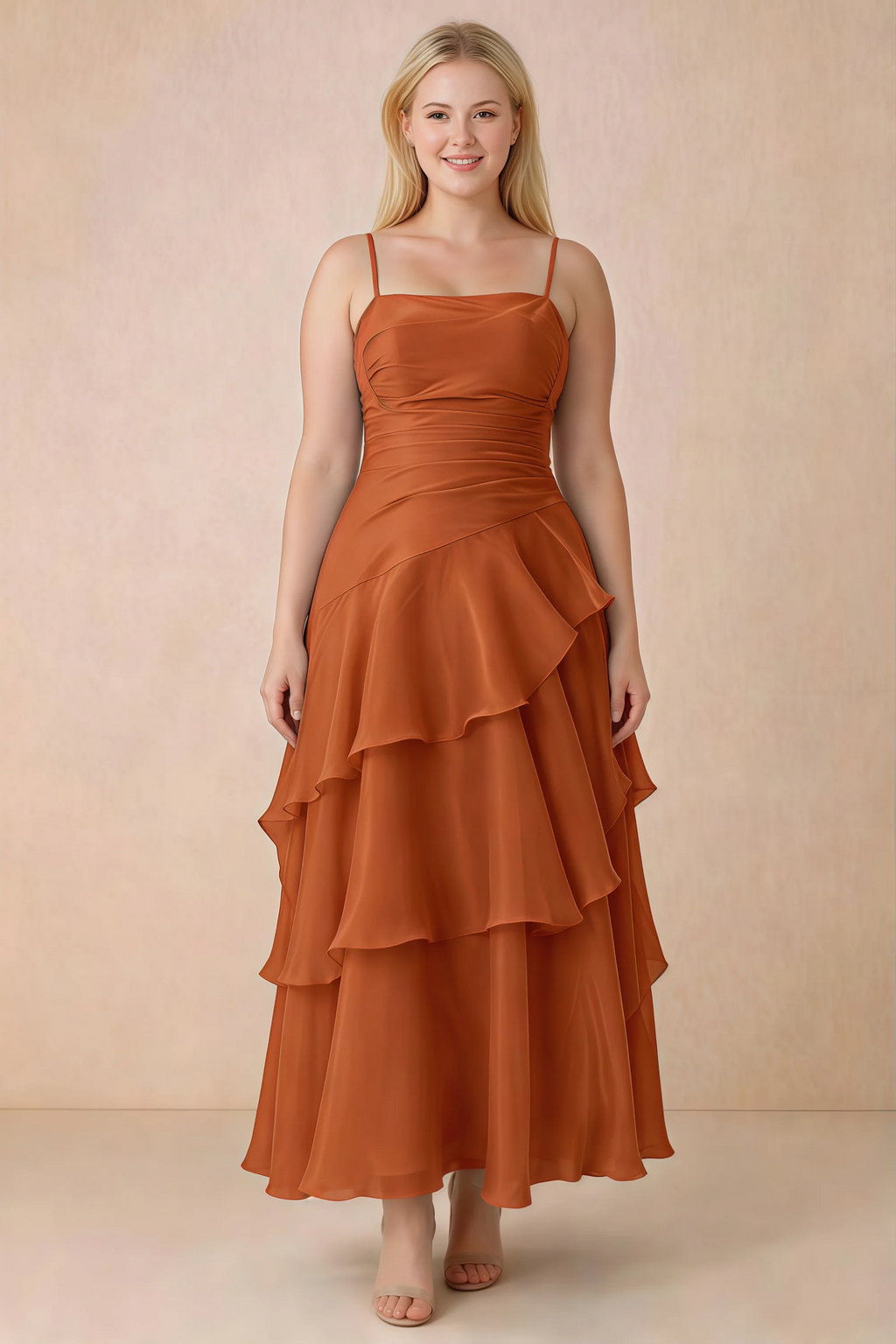 Front studio view of Ava burnt orange ruffle dress with a straight neckline and gathered waist