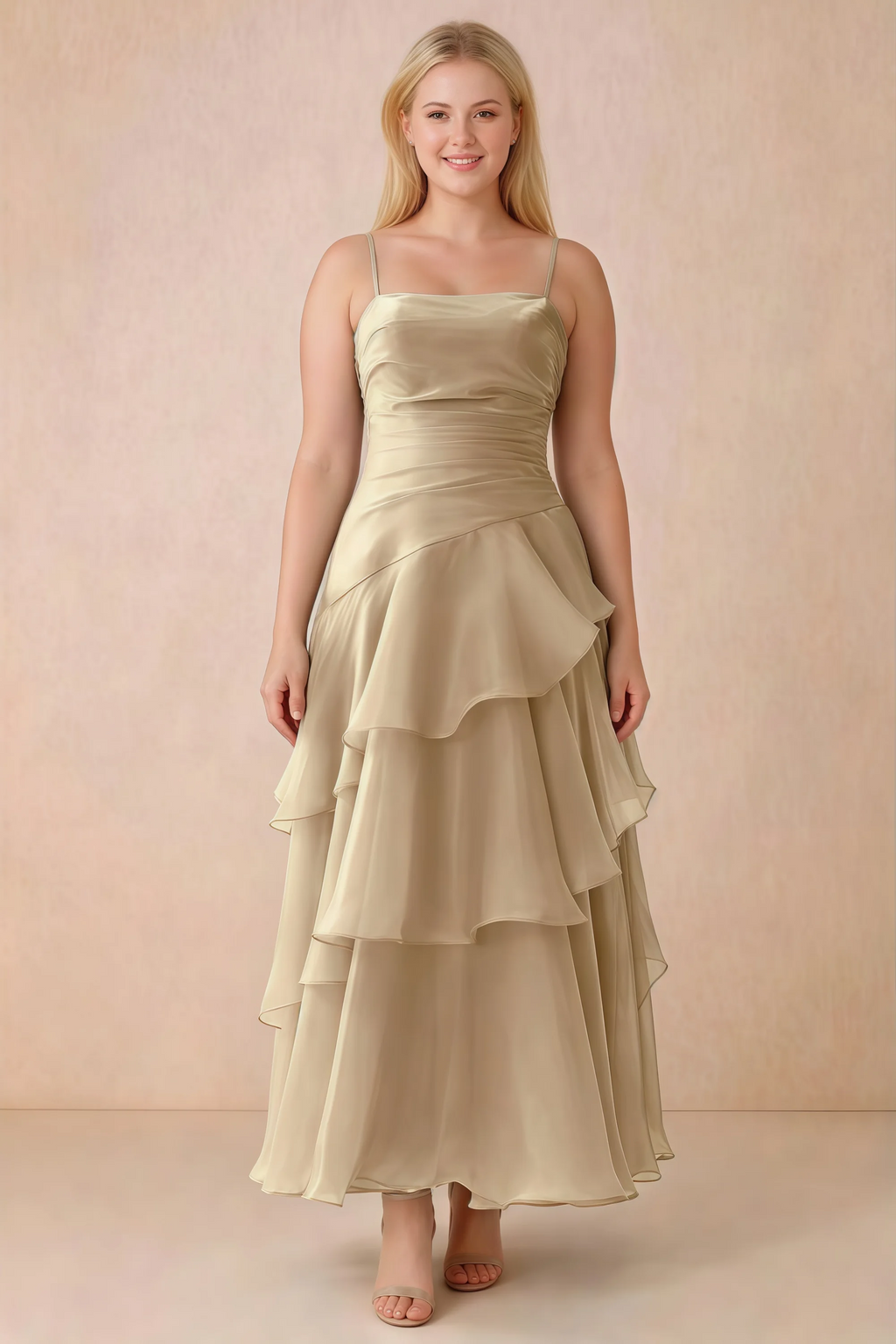 Front studio view of Ava champagne ruffle dress with a straight neckline and gathered waist