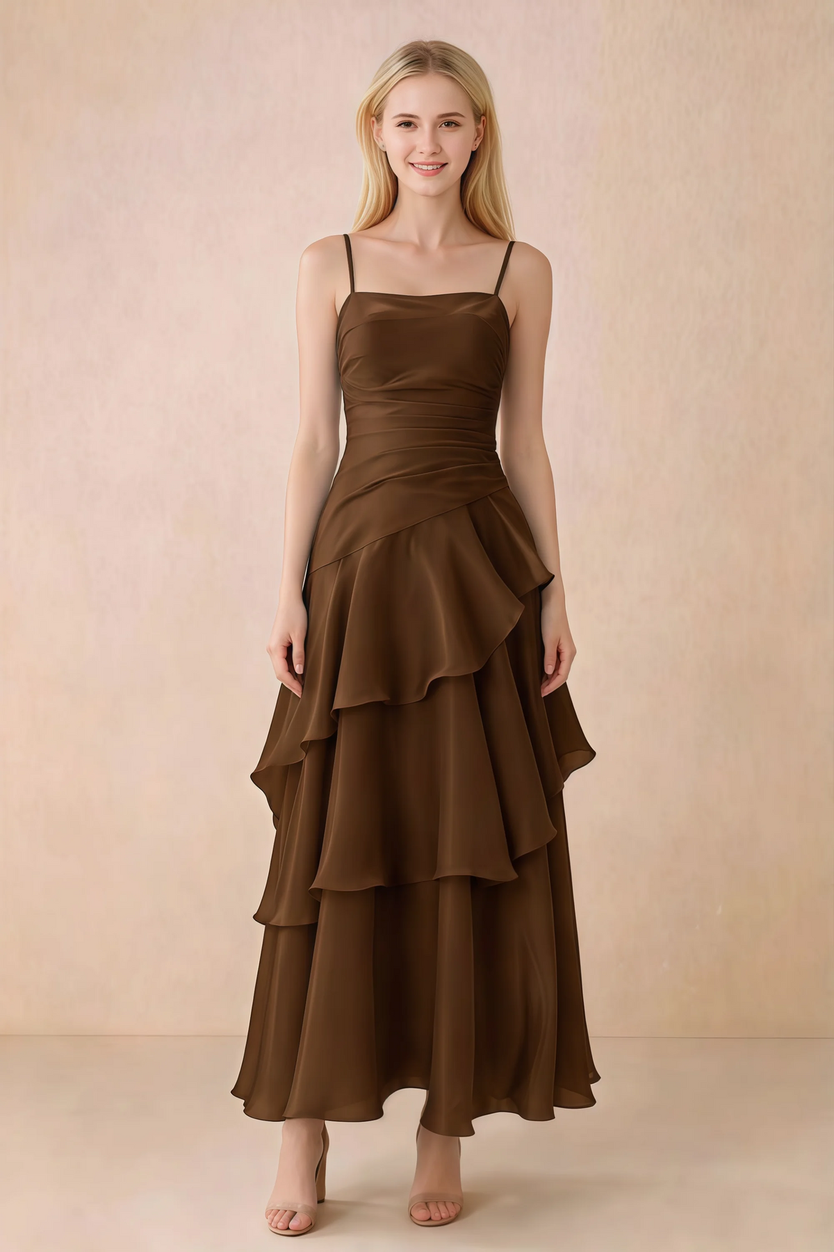 Front view of Ava chocolate brown chiffon maxi dress with thin straps, a fitted bodice and cascading ruffle tiers