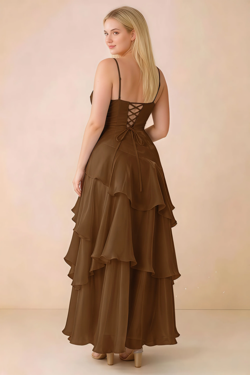 Rear studio view of Ava chocolate brown maxi dress showing the lace-up bodice and long tiered skirt