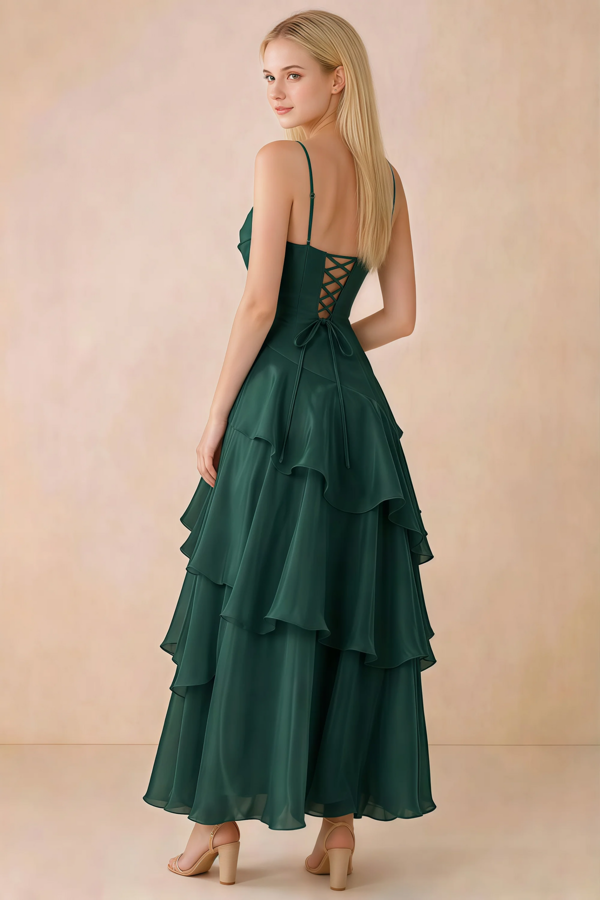 Back view of Ava dark green tiered ruffle dress showing fine shoulder straps and crossed back lacing