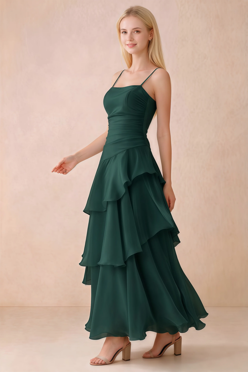 Side view of Ava dark green maxi dress showing the fitted waist and flared ruffle skirt