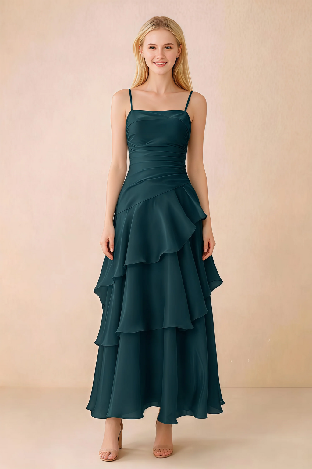 Front view of Ava emerald green chiffon maxi dress with thin straps, a fitted bodice and cascading ruffle tiers
