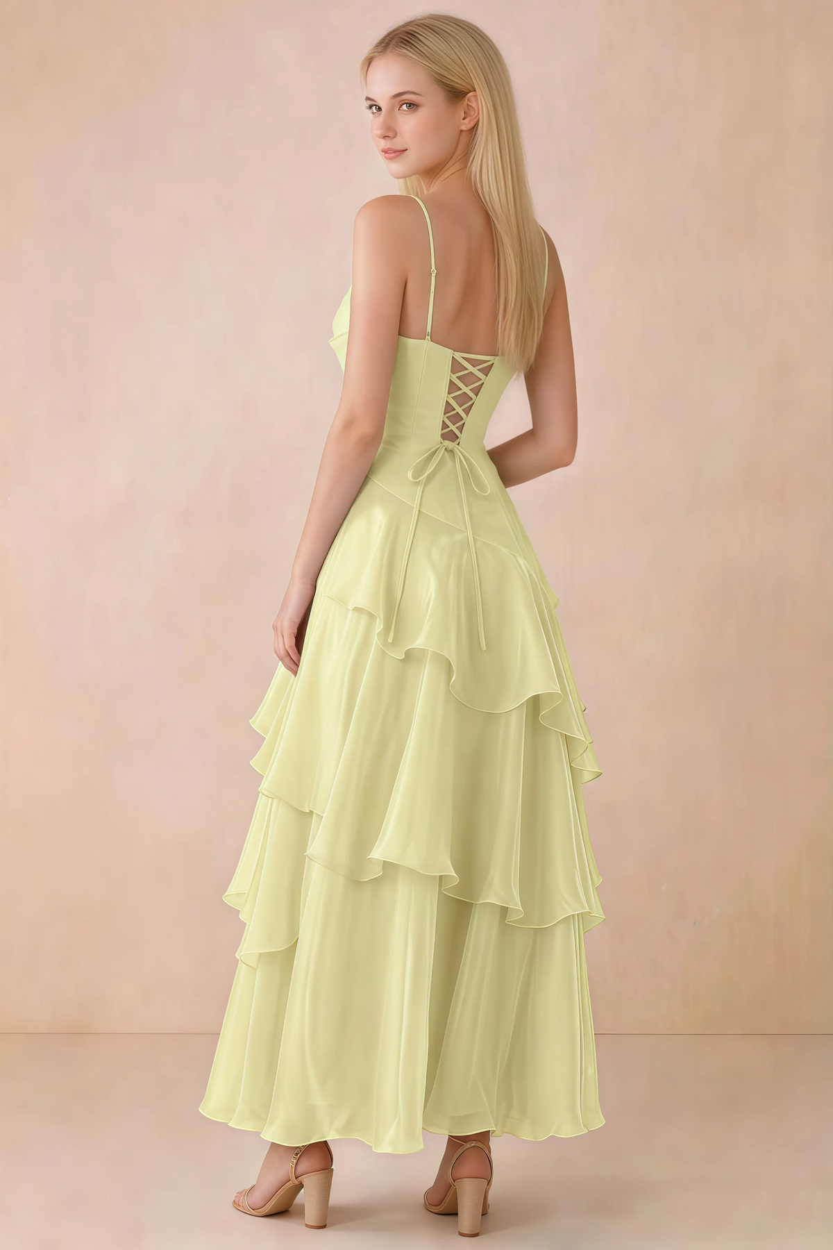 Back view of Ava lemon tiered ruffle dress showing fine shoulder straps and crossed back lacing