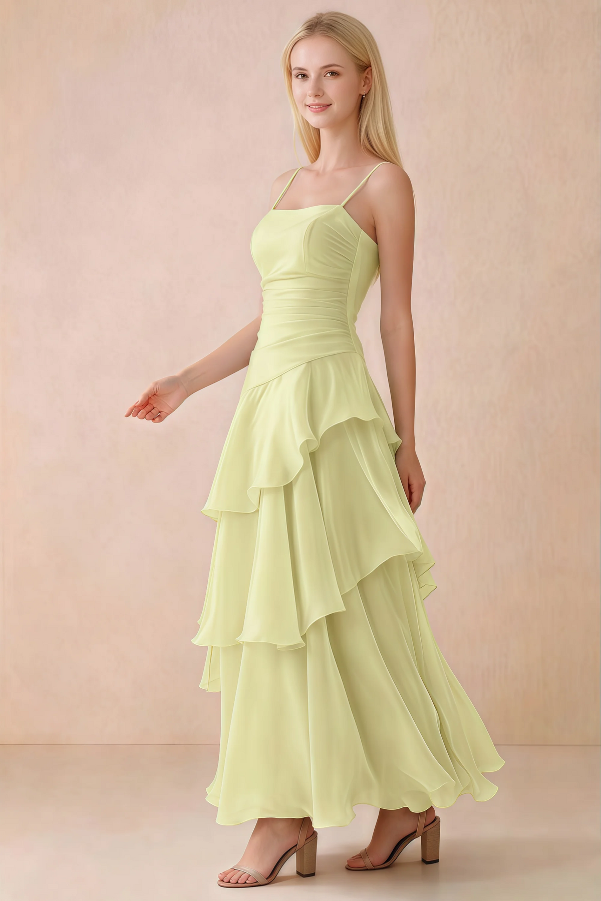 Side view of Ava lemon maxi dress showing the fitted waist and flared ruffle skirt