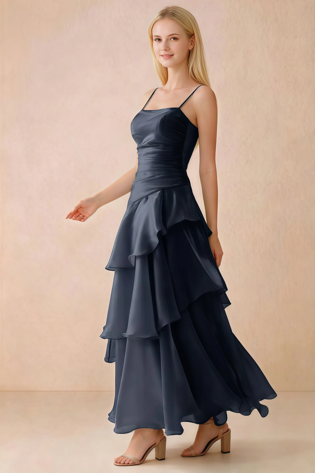 Side view of Ava navy maxi dress showing the fitted waist and flared ruffle skirt