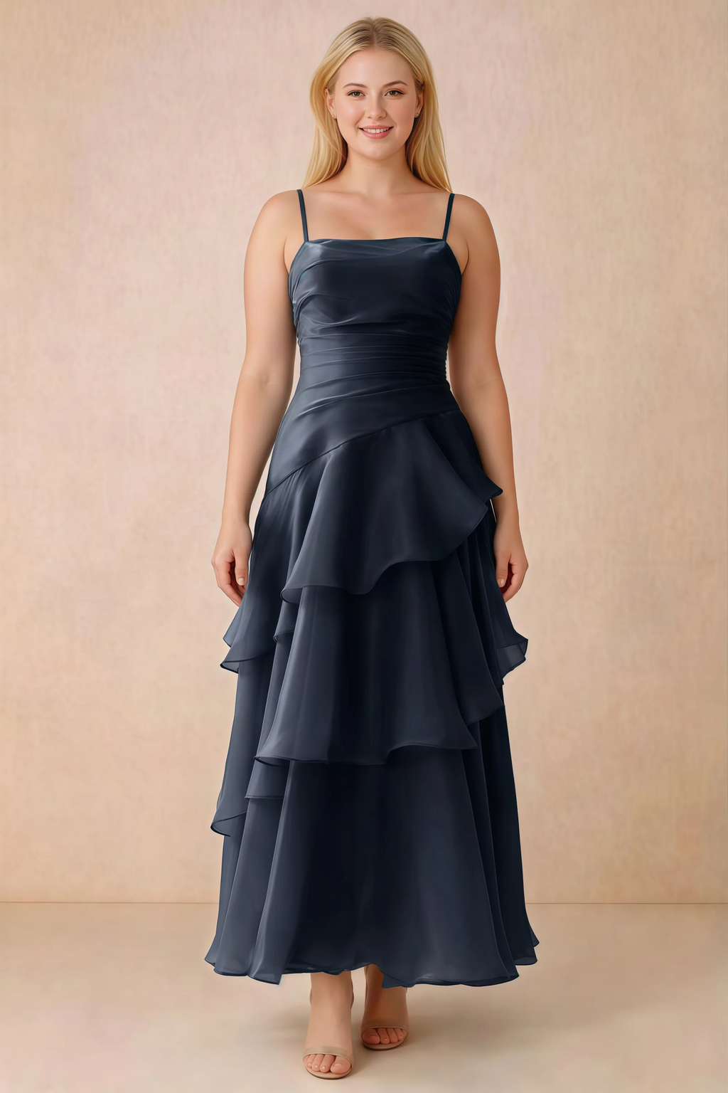 Front studio view of Ava navy ruffle dress with a straight neckline and gathered waist